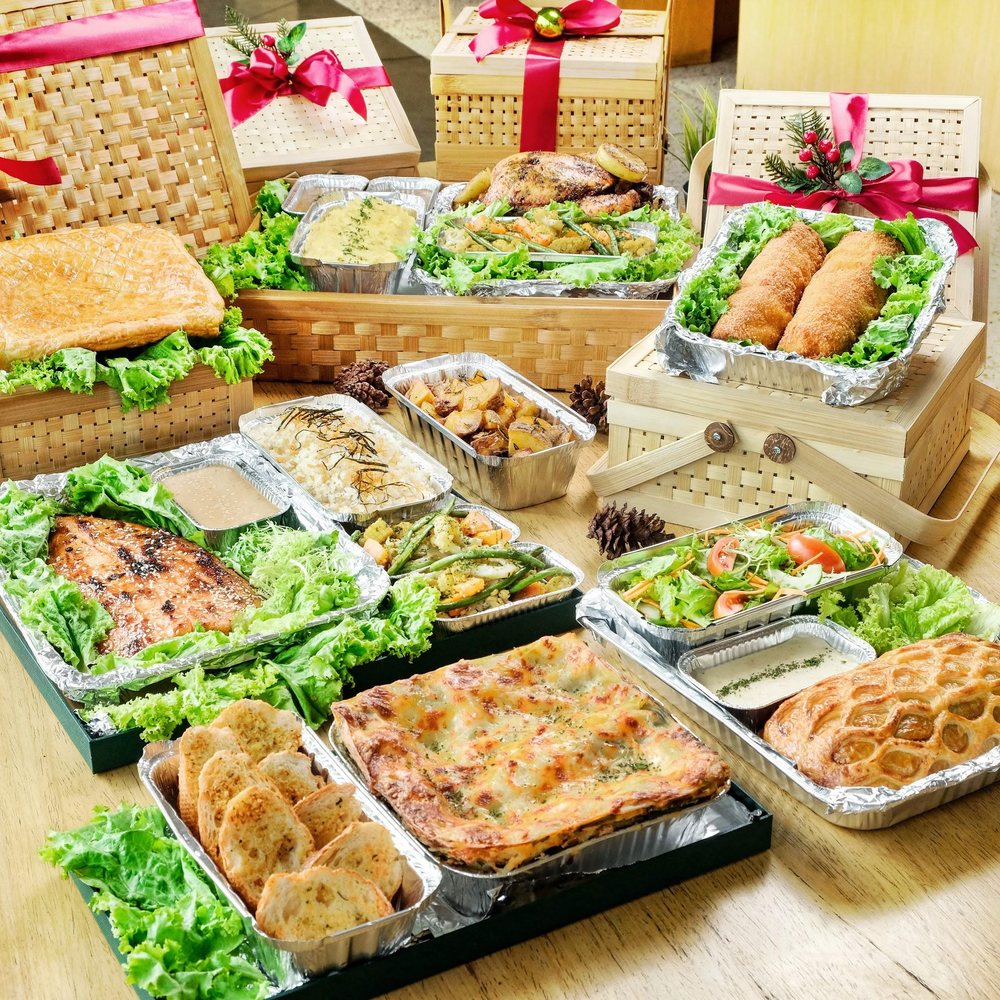 Catering trays and hamper boxes laid out together