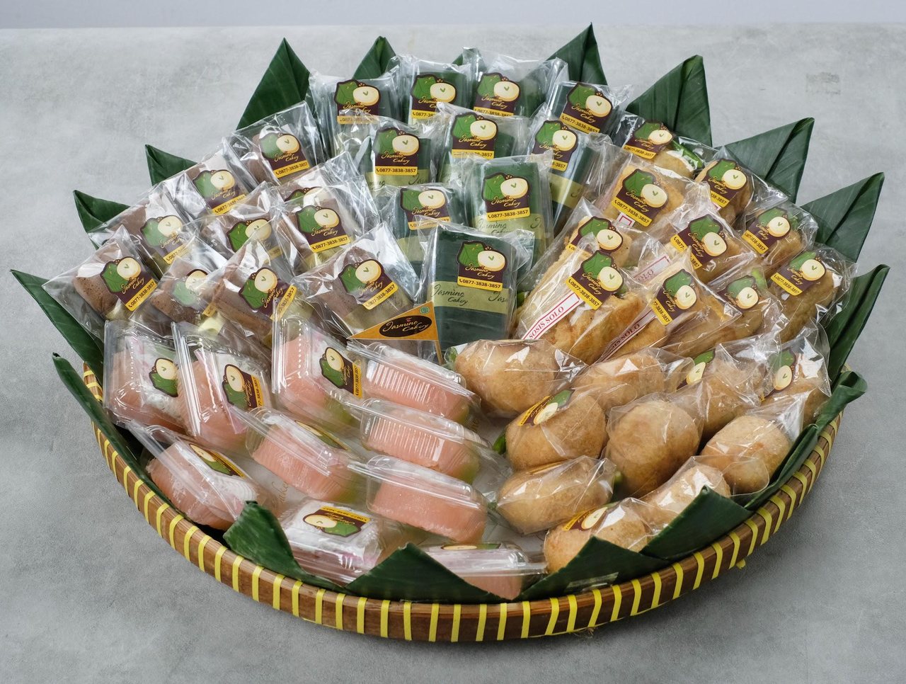 A gold tray of Jasmine Cakery snacks prepared for creators